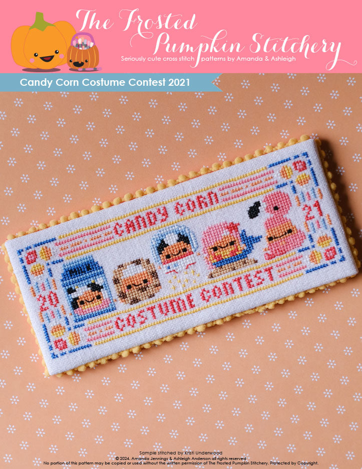 Image of Candy Corn Costume Contest 2021 counted cross stitch pattern. Five little candy corns are in costumes. From left to right they are dressed as a carton of milk, a cookie, an astronaut, a mermaid and a flamingo.