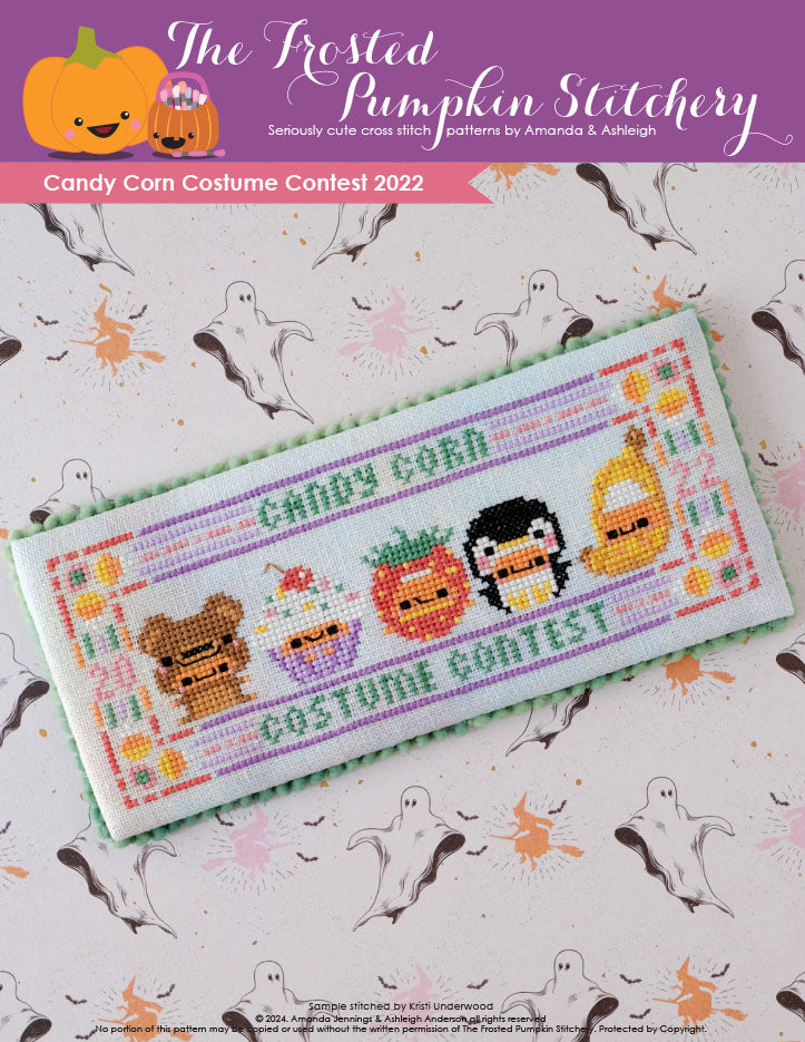 Image of Candy Corn Costume Contest 2022 counted cross stitch pattern. Five little candy corns are in costumes. From left to right they are dressed as a teddy bear, cupcake, strawberry, penguin and banana.
